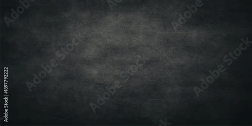 A dark and moody vintage backdrop featuring a textured black chalkboard surface with aged blue grunge patterns and an empty grey paper wall design