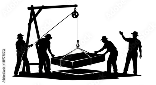 Workers lifting a large crate with a crane in an industrial setting