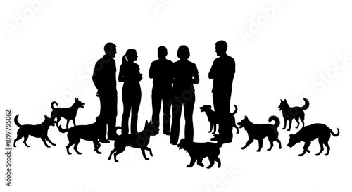 Group of people standing together surrounded by various breeds of dogs in a lively gathering
