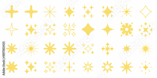 Collection of various yellow starbursts sparkles and diamond shaped glowing elements