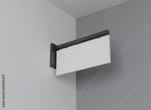 A blank rectangular projecting business sign mockup is mounted on a modern corner wall bracket indoors