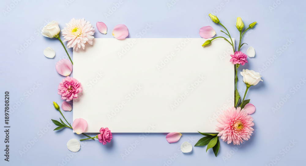Fototapeta premium Paper with pink and flowers and petals on blue background