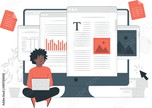 A person working on a laptop with various documents and charts displayed on a large computer screen