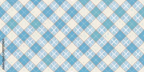 Pale blue and cream argyle pattern creates a seamless repeating textile design