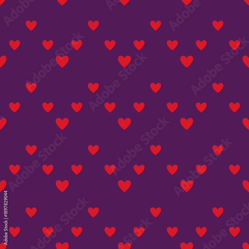A vibrant purple background with many small red hearts.
