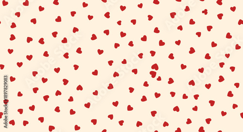 Red heart pattern on cream background.
