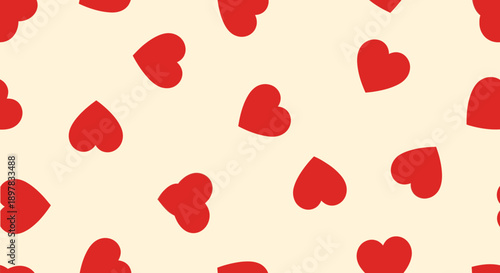 Red heart pattern on cream background.