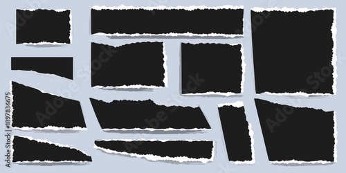 Collection of torn black paper pieces arranged on a light blue background