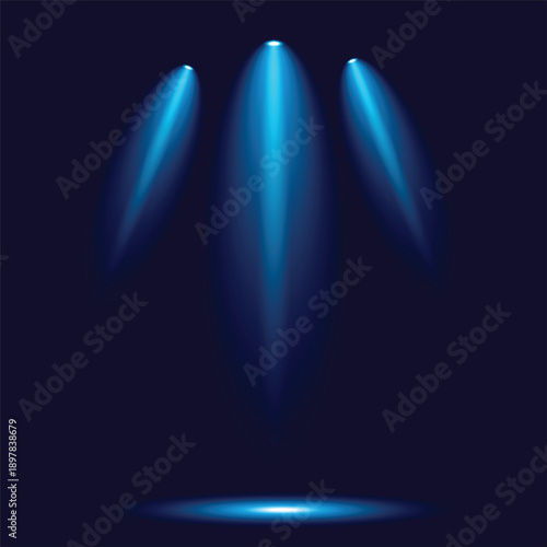 Three intense blue spotlights illuminating a dark stage for a dramatic presentation