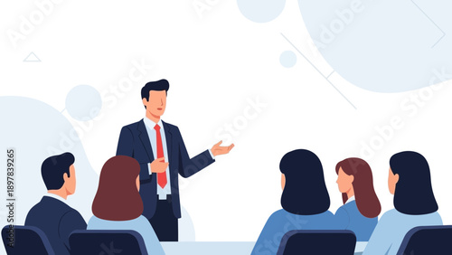 Businessman presenting to an engaged audience in a modern office