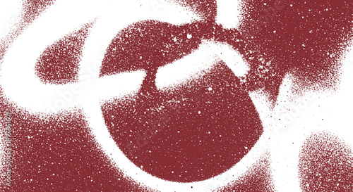 White spray paint graffiti on a red wall closeup view of abstract circular shapes.