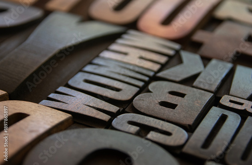 Wooden letterpress printing blocks in closeup