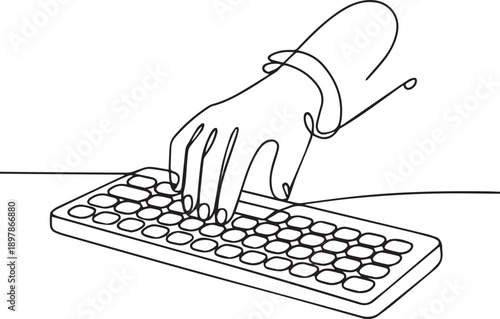Hand typing on a keyboard with stylus nearby on a desk close-up view