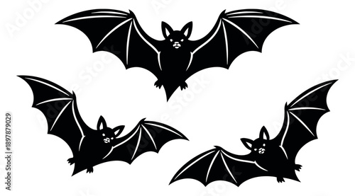 Graphic bat set featuring three black bats in flight for halloween