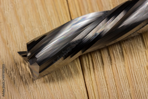 Foto wood processing cutter. spiral carbide cutter. cnc tool.
