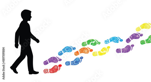 Silhouette of a man walking leaving a trail of colorful footprints behind