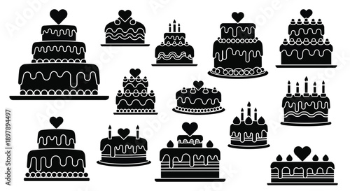 Collection of black and white wedding and birthday cakes on display