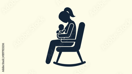 Mother breastfeeding baby sitting in rocking chair.