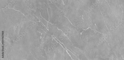 Soft gray marble surface with subtle white veining and cloudy stone texture