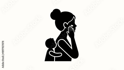 Mother holding child and talking on phone.