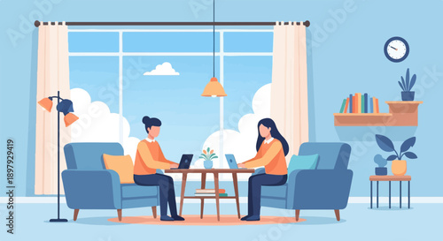 Two individuals work on laptops in comfortable armchairs near a window