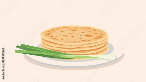 Stack of flatbreads with green onions on a plate