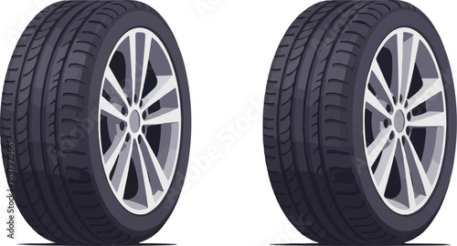 Two modern car tires with alloy wheels, isolated on white