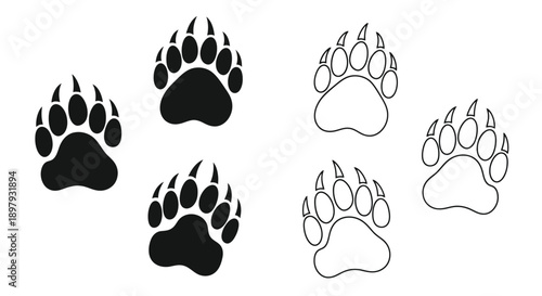 Black and white animal paw prints depicting wildlife tracks
