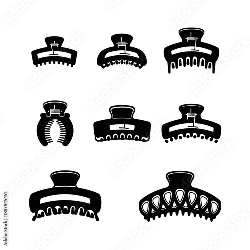 Collection of Black Hair Claw Clips, Various Styles and Sizes, Isolated on White