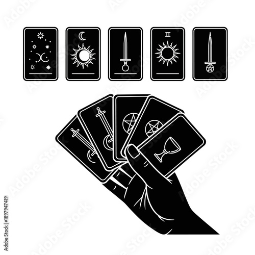 Hand holding tarot cards with mystical symbols, fortune telling concept