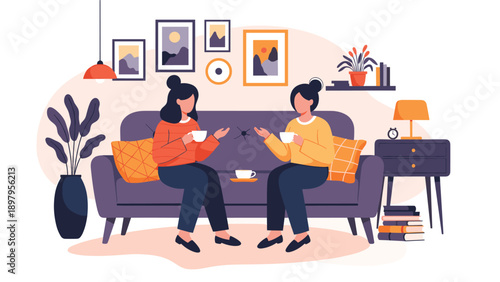 Two female friends sitting on a comfortable purple sofa and enjoying hot tea or coffee while chatting in a cozy decorated living room.