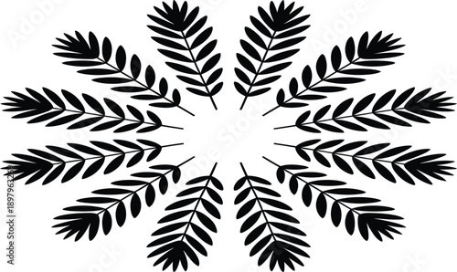 Black silhouette of a snowflake made of fern leaves in a circular pattern