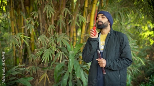 Man Playing and Blowing Bubbles in Garden for Fun, Bonding, and Weekend Leisure Activity