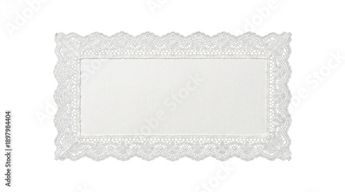 White lace paper doily with decorative scalloped edges and floral patterns