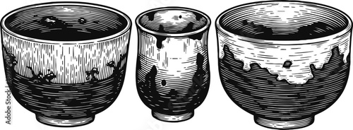 Three vintage hand drawn ceramic bowls set with textured surfaces and rustic patterns