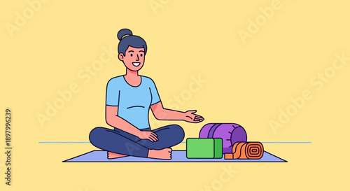 Woman practicing yoga with equipment laid out