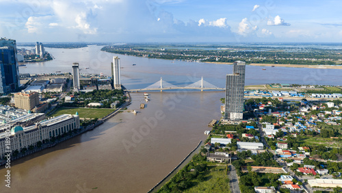 Skyline cityscape view of the river waterfront of Phnom Penh with the Tonle Sap and Mekong river located in Phnom Penh, Cambodia.