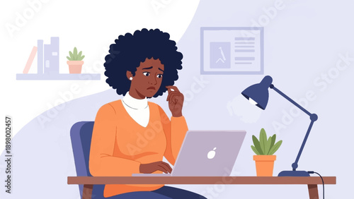 Woman looking stressed at her laptop on her desk with a lamp and plants