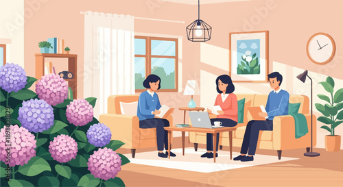 People meeting in a room with hydrangeas, sofas, and artwork