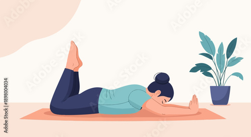 Woman doing yoga on a mat with hands together, near a potted plant