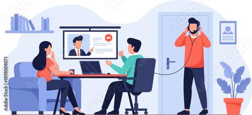 People in an office setting engaged in a virtual meeting or presentation