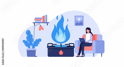 Person working on laptop by a stove with blue flames in a cozy room