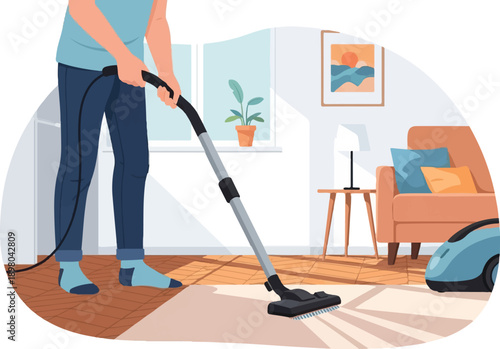 Person vacuuming a room with a sofa, plant, and artwork on the wall