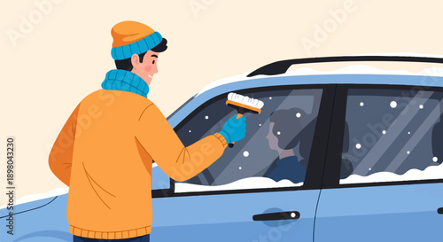 Person clearing snow from car window in winter weather