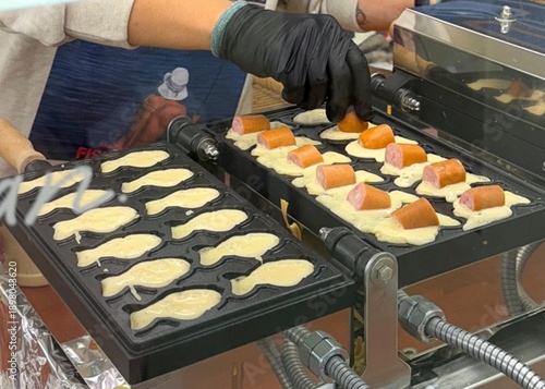 Bungeoppang, bungeo-ppang (Korean Fish Shaped Pastry), popular snack, cookies, sweet in winter streets of Korea. Bungeoppang Korean traditional national food, dish, cuisine. Japanese taiyaki