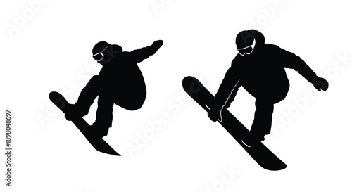 Silhouettes of two snowboarders performing aerial tricks in mid air