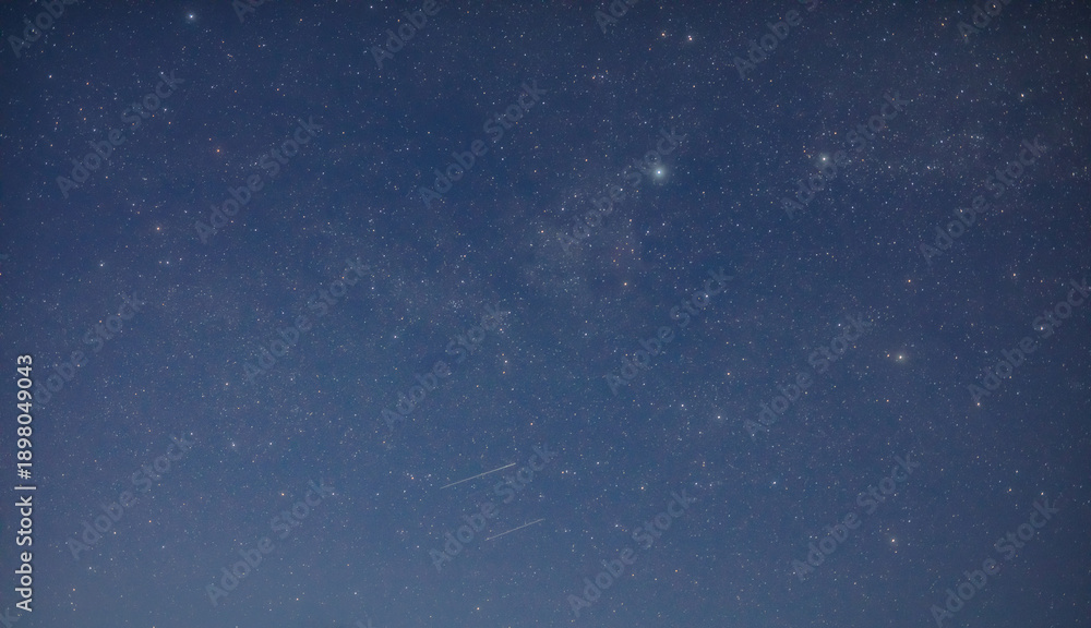 Fototapeta premium Milky way stars and constellations with a galaxy background.