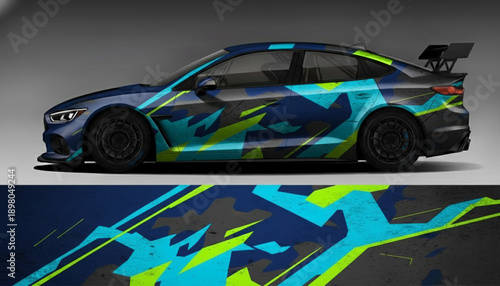 Side view of a modern sports sedan with a vibrant abstract geometric camouflage car wrap design in blue, green, and black colors, with the wrap pattern displayed below.
