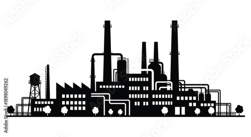 Silhouette of an industrial factory complex with smokestacks and towers