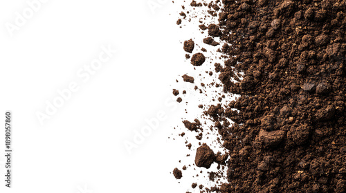 Brown soil texture against black background, detail view, rough earthy material